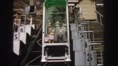Colorado (1958): People In Ride Ascending Upward While They Look Down Between Two