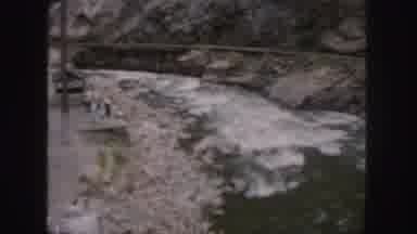 Colorado (1958): River In The Middle Of The Road On One Side Of The Mountain