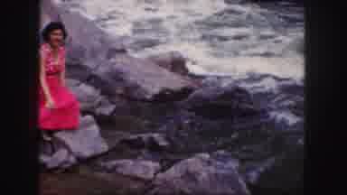 Colorado (1958): The Girl Is Sitting And Showing The Pose To Photos Nearby Water