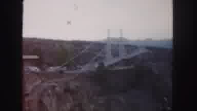 Colorado (1958): White Bridge In The Distance That Expands Connecting Two Sides Of