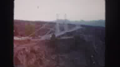 Colorado (1958): Automobiles Travel Over Two Towered Suspension Bridge In