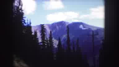 Colorado USA (1958): View Of Mountains And Green Trees On A Clear Sunny Day