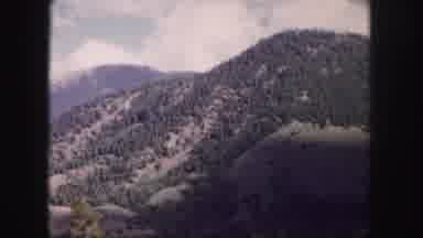Colorado USA (1958): Someone Is Travelling Between Hill Surrounding With Beautiful