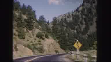 Colorado USA (1958): Clip Of Someone Driving Through A Mountain Terrain As They