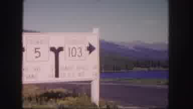 Colorado USA (1958): Road Sign Next To A Panorama Of A Mountain In Colorado With A