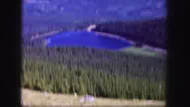 Colorado USA (1958): Woman In Red Sweater Or Coat And Blue Shorts View Nature From