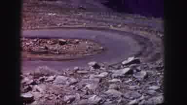 Colorado USA (1958): Man At The Edge Of A Mountain Drinking A Beer Watching A Car