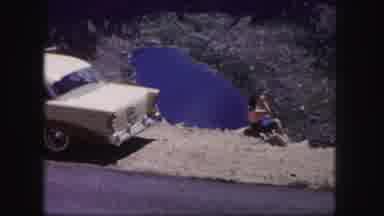 Colorado USA (1958): Woman Overlooks Valley Lake And Waves To Camera