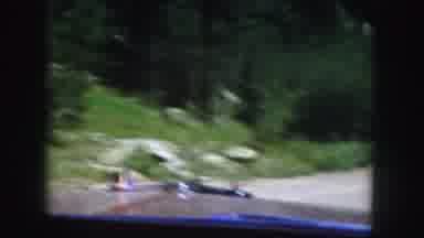 Colorado USA (1958): Someone Is Driving A Car In A Forest Area