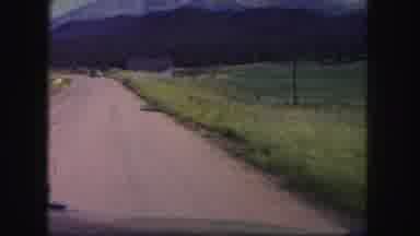 Colorado USA (1958): Driving Fast On A Dirt Road Small House On The Side