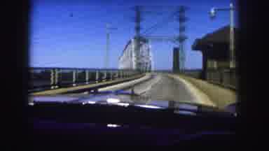 Denver Colorado (1958): A Car Drives Over A Large Bridge Followed By A Short Clip