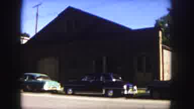 Denver Colorado (1958): Cars Parked In Front Of Building Cutting To Close-Up Of