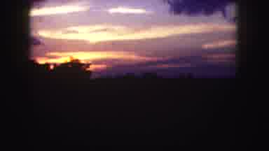 Denver Colorado (1958): A Beautiful View Of The Sun Set Inside Of A Running Car