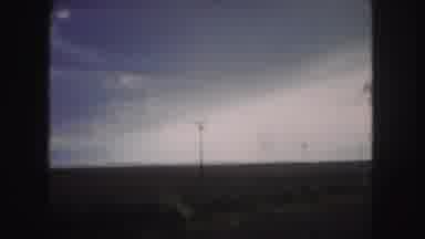 Denver Colorado (1958): Passing View Of Brown And Green Fields On A Clear Day