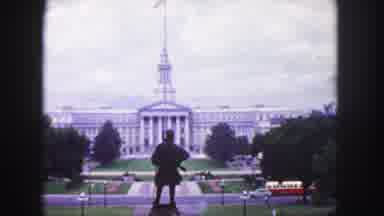 Denver Colorado (1958): Footage Of A City Roadway Along With A Building And Statue
