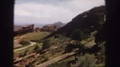 Denver Colorado (1958): A Large Rock Elevated Upwards And Surrounded By Small