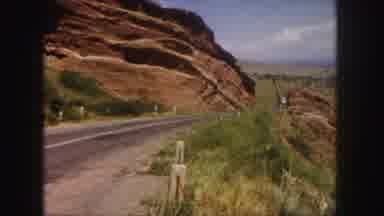 Denver Colorado (1958): People Walk In A Mountainous Landscape
