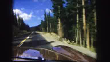 Denver Colorado (1958): Car Driving Through On A Mountain Road On A Sunny Day