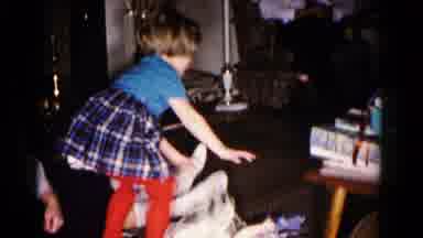 Hagerstown Maryland USA (1958): Girl Opening Presents And Dancing In Front Of The