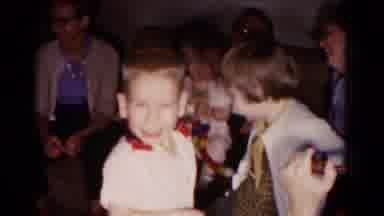 Hagerstown Maryland USA (1958): A Man With A Pipe Plays With A Small Boy With