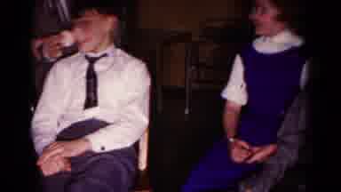 Hagerstown Maryland USA-1958: Children Sitting In A Chair And Around Several