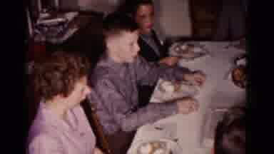 Hagerstown Maryland USA (1958): People Sitting And Eating Evening Meal At A White