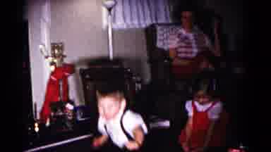 Hagerstown Maryland USA (1958): Boy Plays With Sister In The Living Room Of His