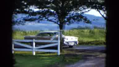 Las Vegas USA (1958): View Of Yellow Car Turning Onto Dirt Road On A Sunny Day