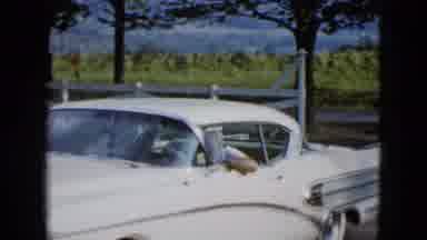 Las Vegas USA (1958): Man Driving Up To Park In A Driveway In A Shiny Clean White