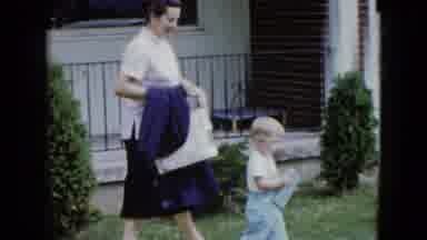 Las Vegas USA (1958): Mom Walking Outside Of Home With Son Woman Playing With Dog