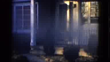 Las Vegas USA (1958): A Front Door Opens To Let A Dog Run Out Excitedly Into The