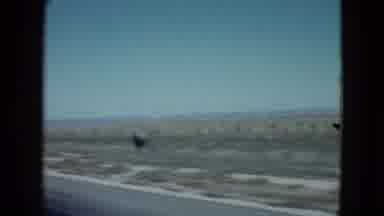 Las Vegas USA (1958): Pan Of The Desert A Road Sand And Some Bushes From Inside Of