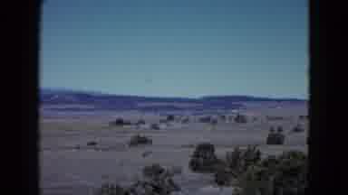 Las Vegas USA (1958): Open Desert That Has Bushes And Mountains In The Background