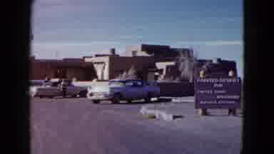 Las Vegas USA (1958): Road Car Flag Post Flag Tree Road Sign Road Side Board