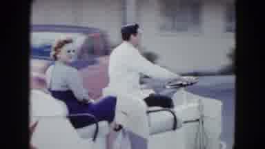 Las Vegas USA (1958): The Persons Are Travelling In The Mini Open Carthey Enjoy