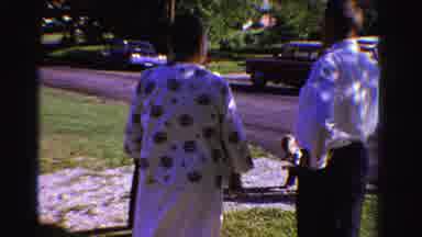 Ontario Canada (1958): People Standing And Discussing In A Typical Suburban Street