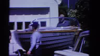 Ontario Canada (1958): Three Men And Boy In The Driveway Walking Past A Boat And A