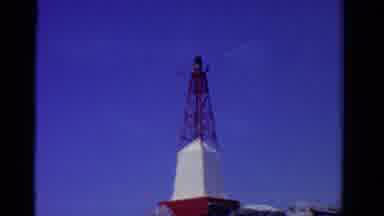 Ontario Canada (1958): Lighthouse And A Boy On A Boat On The Water Wearing A Life
