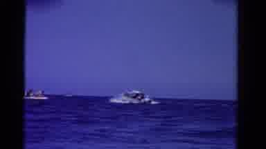 Ontario Canada (1958): Speedboat Moving Towards People On Raft On A Bright Sunny