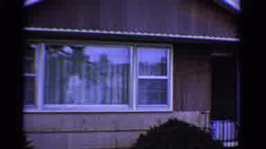 Ontario Canada (1958): An Old House With A Black Railing That Could Potentially Be
