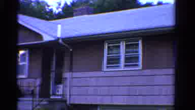 Ontario Canada (1958): A Slow Spanning Shot Of A Home With Several Windows A Porch
