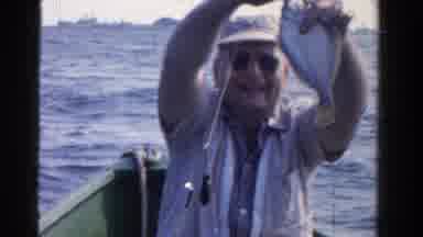 Ontario Canada (1958): A Man In The Boat Catch The Fish In The Center Of The Ocean