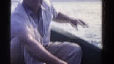 Ontario Canada (1958): A Man In A Boat On The Lake Fishing