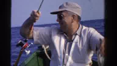 Ontario Canada (1958): Old Man Fishing In A Boat Surrounded By A Vast Blue Ocean