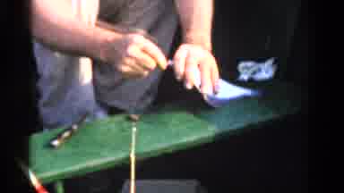 Ontario Canada (1958): Man That Caught Fish Appears To Attempt To Remove Hook From