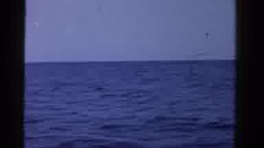 Ontario Canada (1958): View Of A Calm Ocean With Two Boats In Eye Shot Under A