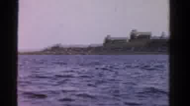 Ontario Canada (1958): A Person On A Boat Is Taking A Video Of A Body Of Water