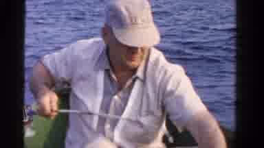 Ontario Canada (1958): The Two Persons Are In The Boat And Caught A Fish In The