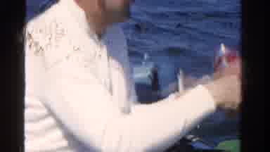 Ontario Canada (1958): Middle Aged Man Reeling In A Fish