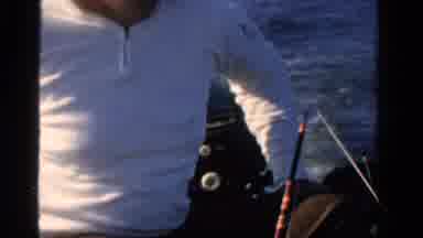 ONTARIO CANADA-1958: Man Fishing On Lake In Vintage 8mm Home Movie